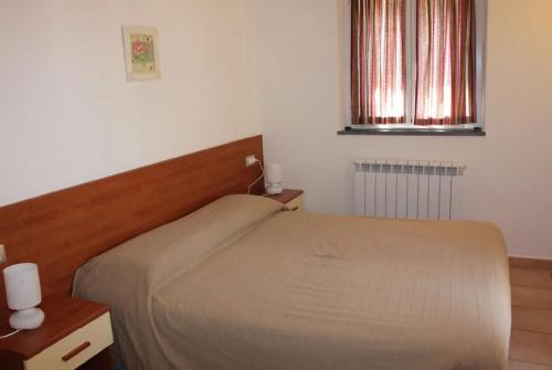 Katil atau katil-katil dalam bilik di Hotel Villa Argentina