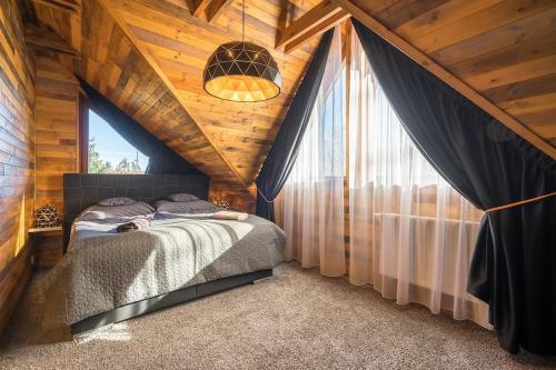 מיטה או מיטות בחדר ב-Luxury Chalet in High Tatras