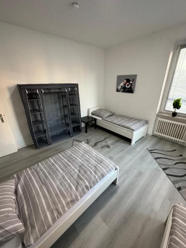 Llit o llits en una habitació de FeWo for max 6 Guests near Hagen-City