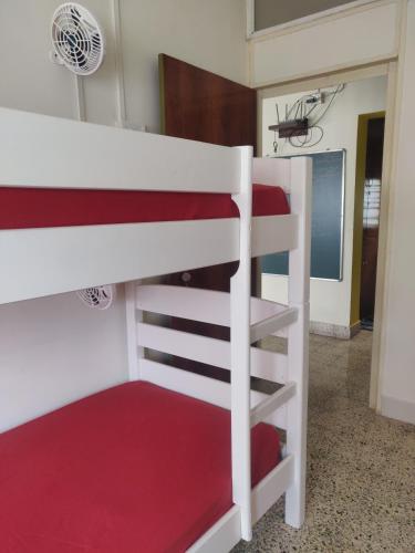 a bedroom with two bunk beds in a room at Raahgir in Nashik