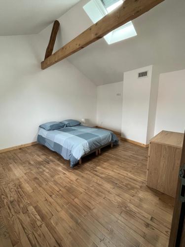 Posteľ alebo postele v izbe v ubytovaní Superbe maison de ville, rénovée à 15 min de Lyon