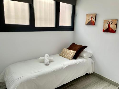 Posteľ alebo postele v izbe v ubytovaní Apartamento La Estrella