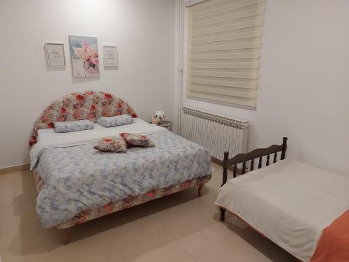 Ένα ή περισσότερα κρεβάτια σε δωμάτιο στο Apartman Pale Jahorina