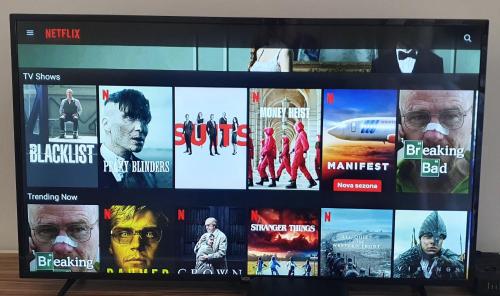 a television screen with many movies on it at Tuzlaks appartment in Sarajevo