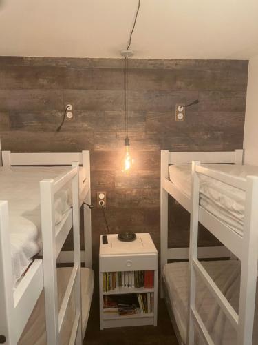 Postel nebo postele na pokoji v ubytování Le cheval noir 37 (6-7 couchages )