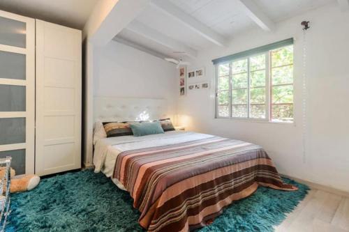 Posteľ alebo postele v izbe v ubytovaní Stylish Ibiza Villa Near Beaches Private Pool & Lush Garden