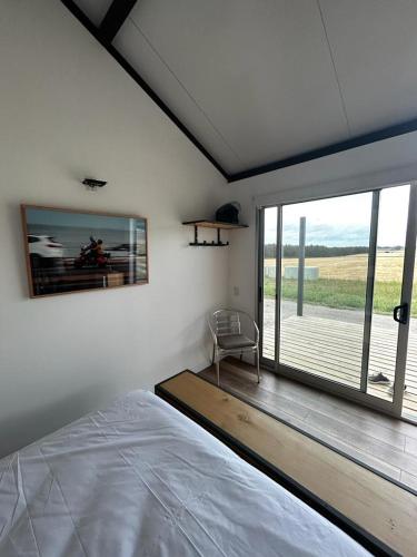 Katil atau katil-katil dalam bilik di Hoxhohl Travel Lodge
