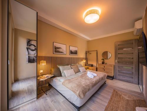 Postel nebo postele na pokoji v ubytování Balatonic Relax