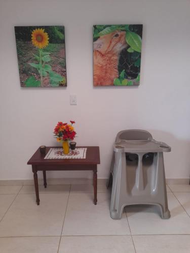 a coffee table and a dog stool in a room at FINCA LUNADAR ANAPOIMA in Anapoima