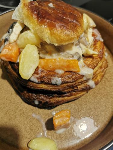 a plate of food with a pastry and pastries at Au domaine de Gigie in Chervettes