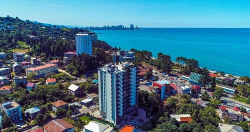 an aerial view of a city and the ocean at Next Green Aparthotel OFFICIAL in Batumi
