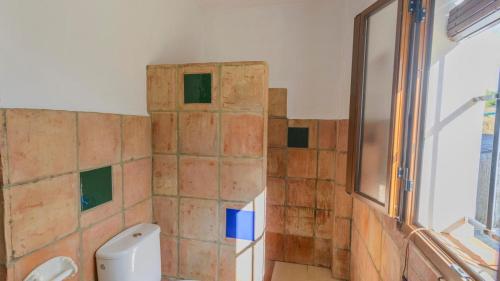 Koupelna v ubytování El Garrotal - El Aceite Almazara El Bosque by Ruralidays