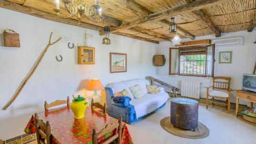 Posezení v ubytování El Garrotal - El Aceite Almazara El Bosque by Ruralidays