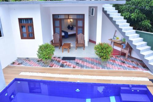 Bazén v ubytování Ceylon Relax Villa nebo v jeho okolí