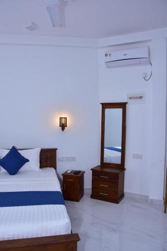 Postel nebo postele na pokoji v ubytování Ceylon Relax Villa