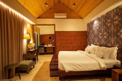 Postel nebo postele na pokoji v ubytování AATHAVAN MATICHI ECO RESORT