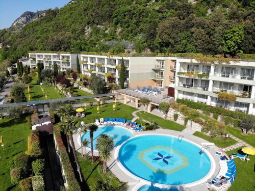 an aerial view of a resort with a swimming pool at Majestic Palace in Malcesine