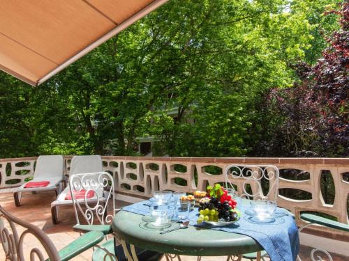 a table and chairs sitting on a patio at Apartment S'Esquirol Nº9 by Interhome in Begur
