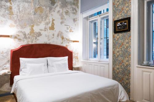 Posteľ alebo postele v izbe v ubytovaní Metropolis Budapest Boutique Hotel