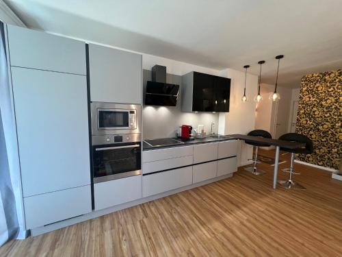 Kuchyň nebo kuchyňský kout v ubytování Apartment Panorama Apartments Ehrmann by Interhome