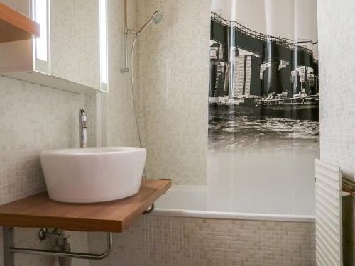 Koupelna v ubytování Apartment Cassiopée 26 by Interhome