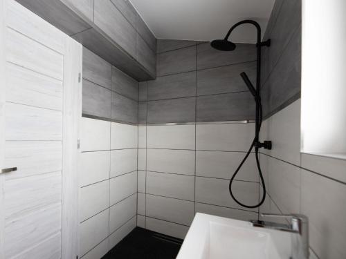 a bathroom with a shower with a sink at Holiday Home Tanvald by Interhome in Tanvald