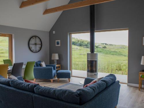 A seating area at Holiday Home Upper Milovaig by Interhome