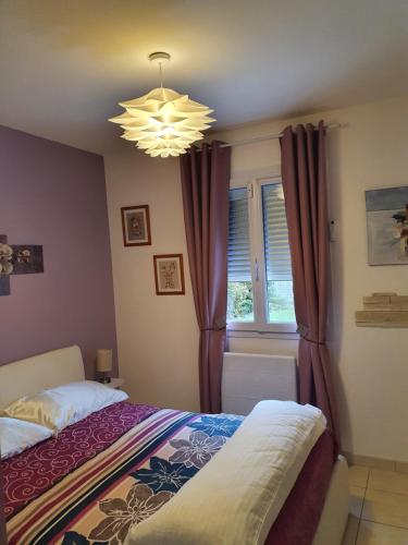 Ένα ή περισσότερα κρεβάτια σε δωμάτιο στο Brigitte