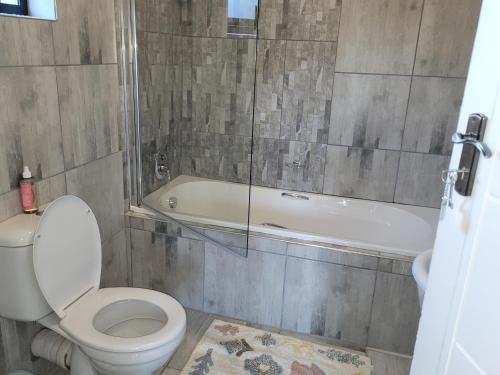 Koupelna v ubytování Ayana bnb