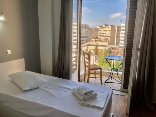 Postel nebo postele na pokoji v ubytování Sparta Team Hotel