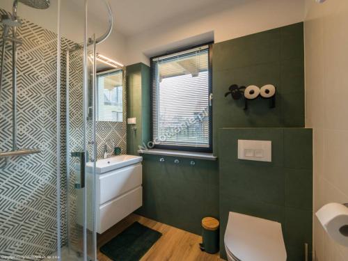 Kúpeľňa v ubytovaní Apartament Czarna Owca - Grapa SUN & SNOW 667-494-631