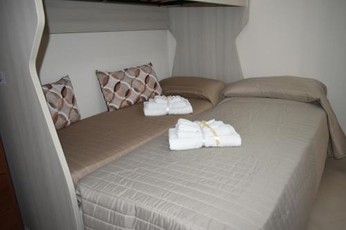 Een bed of bedden in een kamer bij B&B Residenza Borbonica