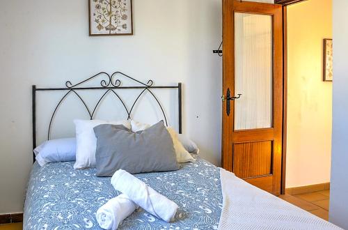Posteľ alebo postele v izbe v ubytovaní Apartamento Casa Pilatos