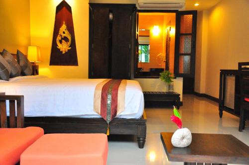 Posezení v ubytování Navatara Phuket Resort