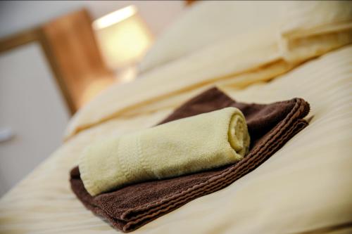 Una cama o camas en una habitación de Cuba Bar & Hostel