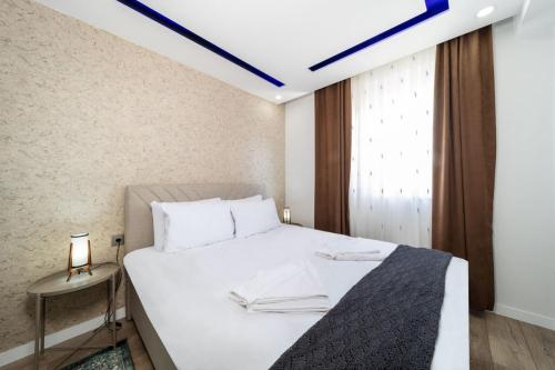 Postel nebo postele na pokoji v ubytování Modern and Central Home near Beach in the Heart of Antalya
