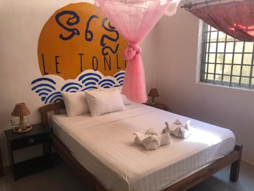 Nomad Guesthouse客房内的一张或多张床位