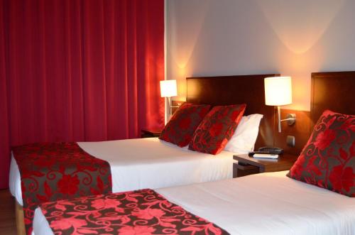 Hotel Torres Novasにあるベッド