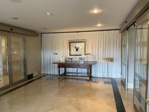 a room with a desk in the middle of a building at Parador de Puebla de Sanabria in Puebla de Sanabria