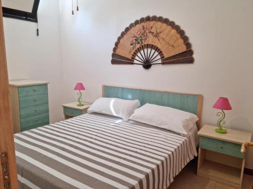 A bed or beds in a room at Viestecasa