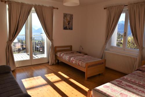 A bed or beds in a room at Casa Martina