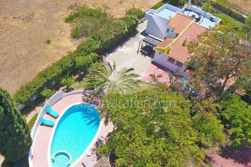 an aerial view of a house with a swimming pool at Villa Felicity in Porches