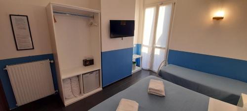 Katil atau katil-katil dalam bilik di Hotel Villa Argentina