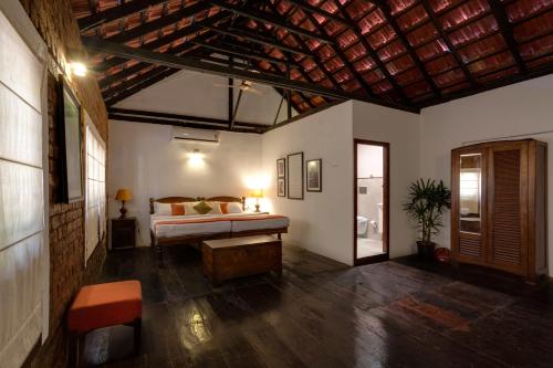 Postel nebo postele na pokoji v ubytování Niyati - Boutique Stay