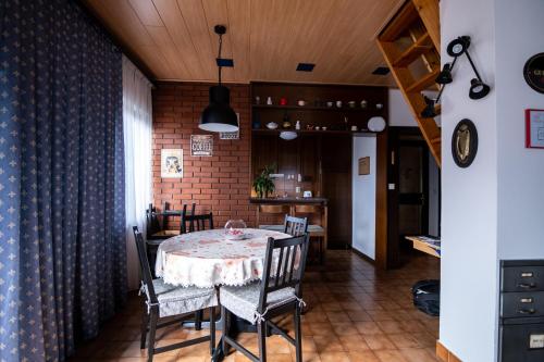 a dining room with a table and chairs at Apartment Bišćan Samobor in Samobor