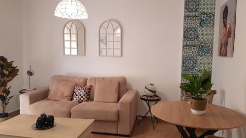 A seating area at Duquesa María Apartamento en el corazón de Granada