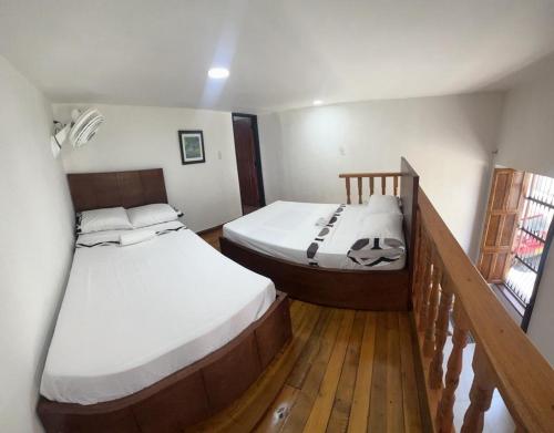 Postel nebo postele na pokoji v ubytování Agradable casa en Buga junto a la basílica