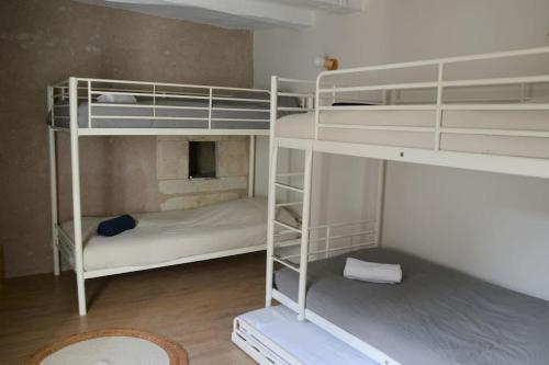 Krevet ili kreveti na kat u jedinici u objektu Maison chaleureuse entre la Touraine et le Berry
