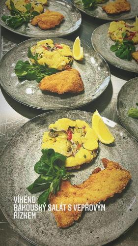 a group of plates of food on a table at Sousedi Pavlov in Pavlov