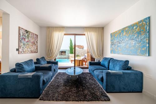 Χώρος καθιστικού στο Villa Nena